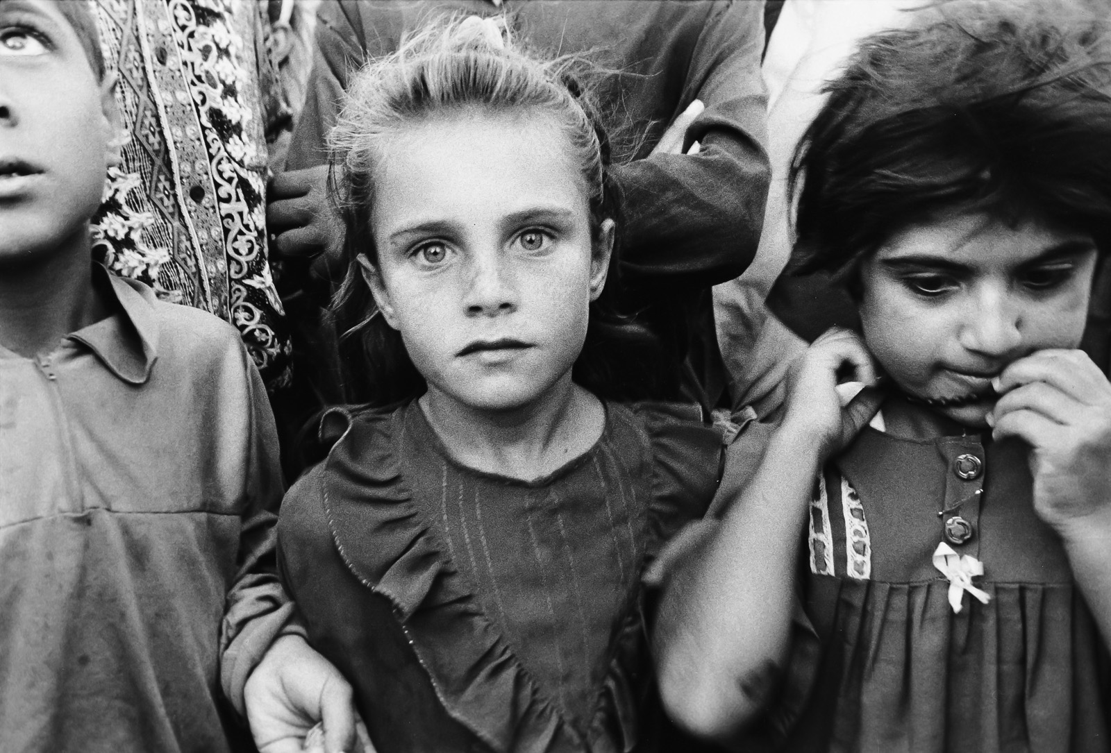 Michele Cazzani, Sabria, ultima di otto figli, campo profughi di Chiamchamal, 2004. © Archivio Photoaid.